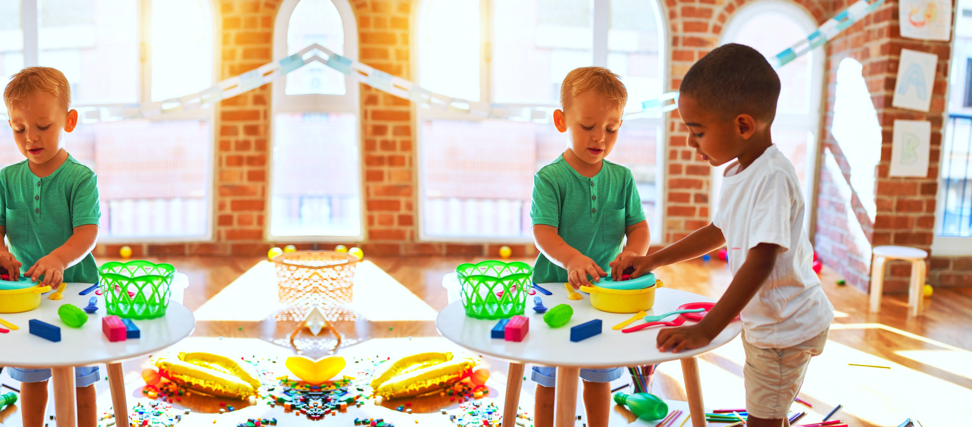 two male kids playing inside a classroom